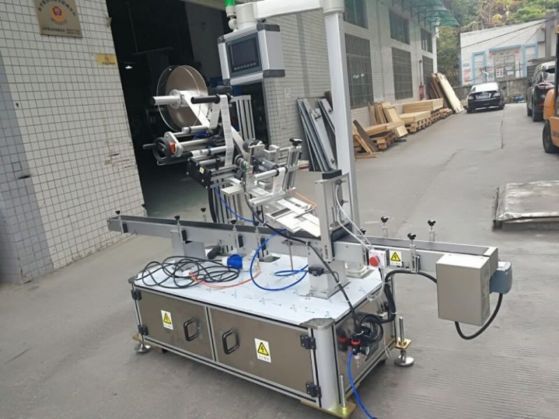 Mesin Labeling Top Stiker China Kanggo pemasok Tipe Listrik Dorong Kantong Listrik